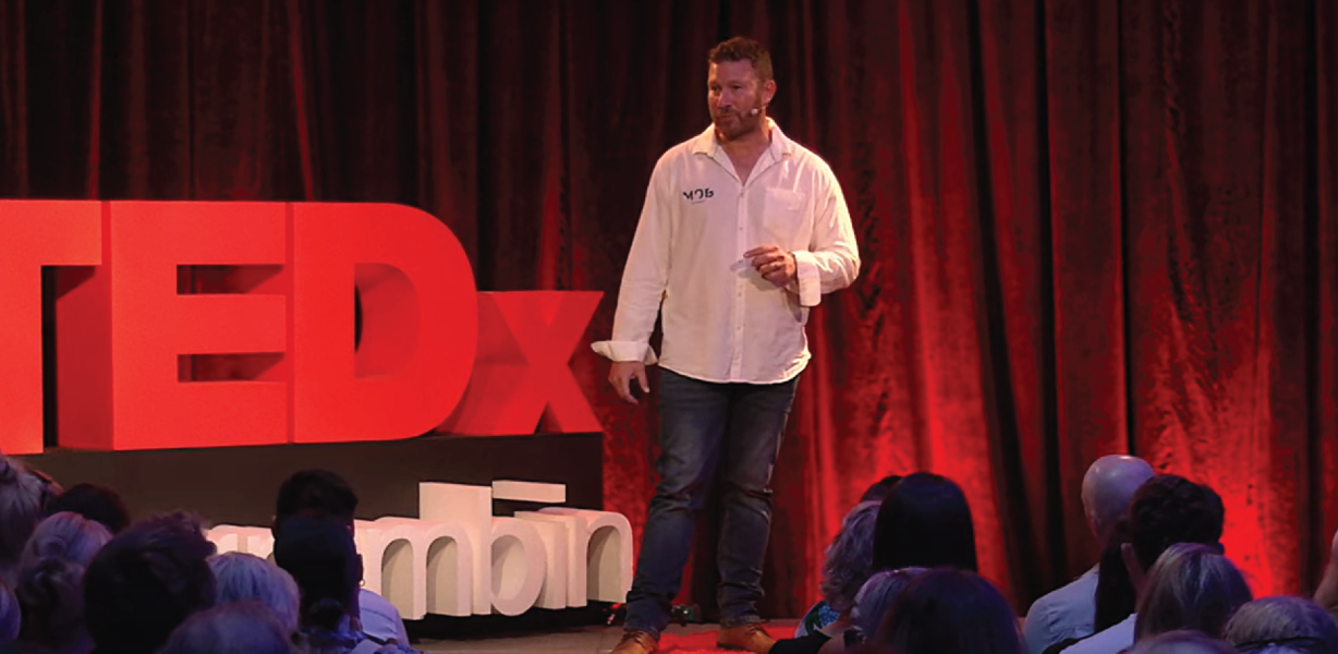 Photo of Marco Renai speaking at TEDx